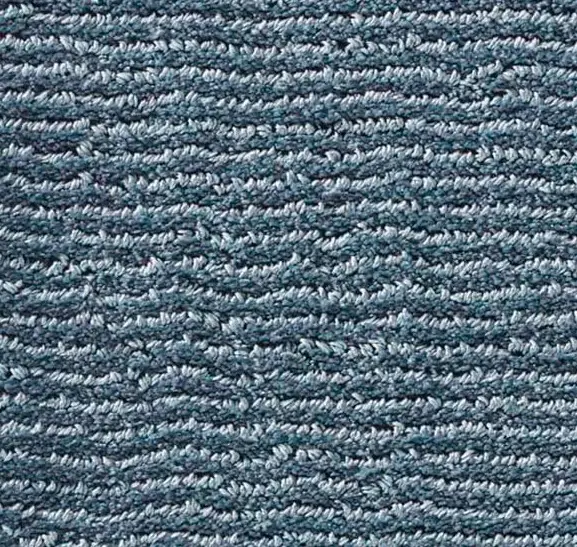 Blue textured carpet with plush, dense pile for residential and commercial flooring.