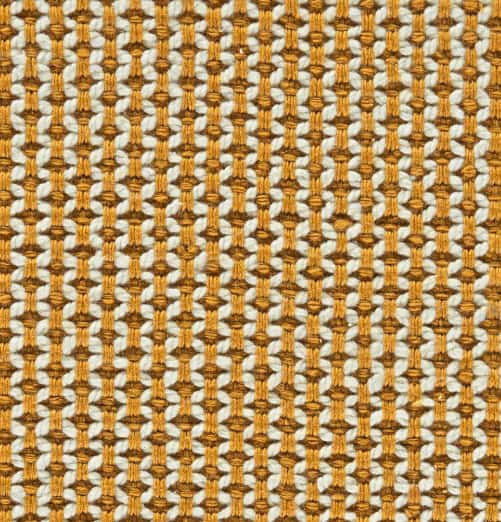 Bright yellow and white woven rug with textured pattern for home decor and interior styling.