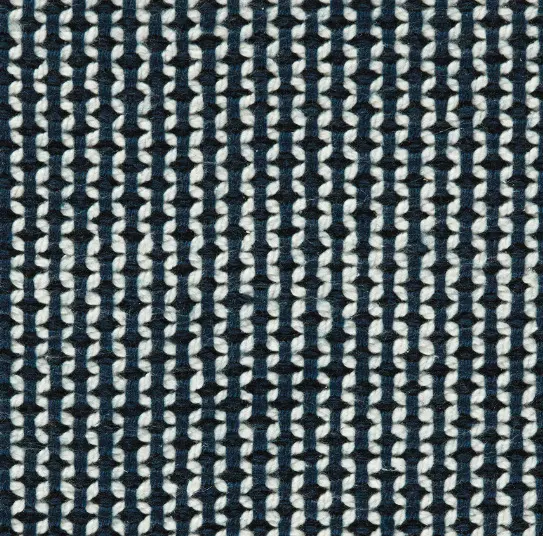 Black and white patterned carpet floor tile design for modern interior spaces.