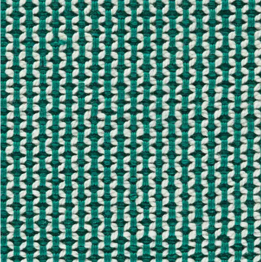 Bright teal and white patterned rug with geometric design, ideal for modern home flooring.