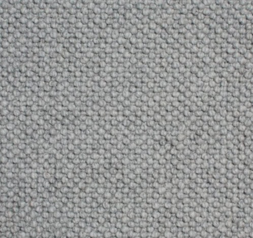 Soft gray textured carpet for residential and commercial flooring.