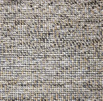 Colorful woven area rug with intricate patterns for interior home decor and flooring.