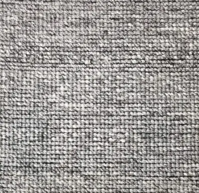 Soft gray textured carpet for home and commercial flooring solutions.