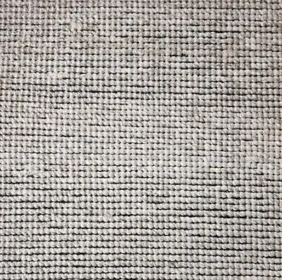 Soft textured beige carpet with plush fibers, ideal for residential and commercial flooring.