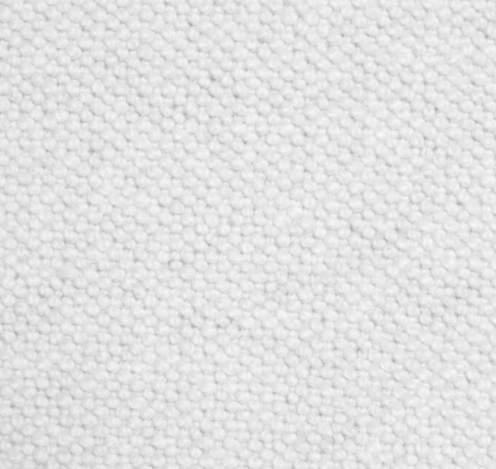 Soft white textured carpet flooring in a premium residential or commercial space.