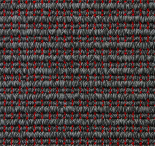 Dark gray industrial carpet with red accent lines, durable commercial flooring option.