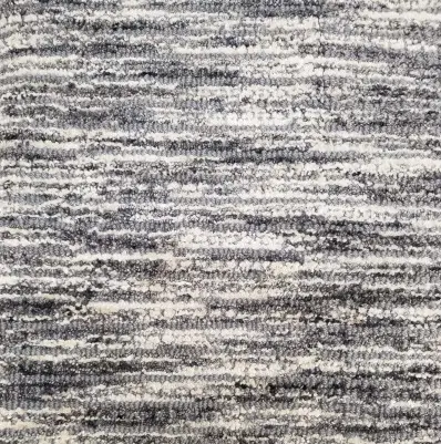 Soft gray and beige textured carpet with modern design, suitable for residential and commercial flooring.