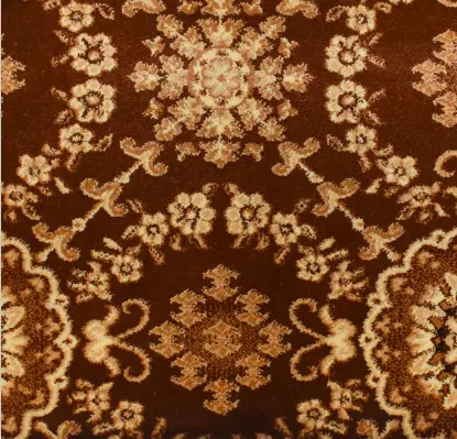 Luxurious traditional patterned carpet with floral motifs in rich, warm tones.