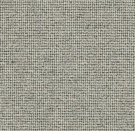 Soft beige woven carpet texture for flooring and interior design projects.