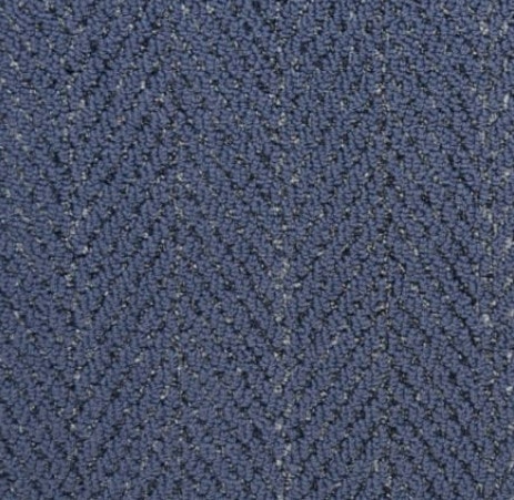 Blue textured commercial carpet showcasing durability and style for interiors.