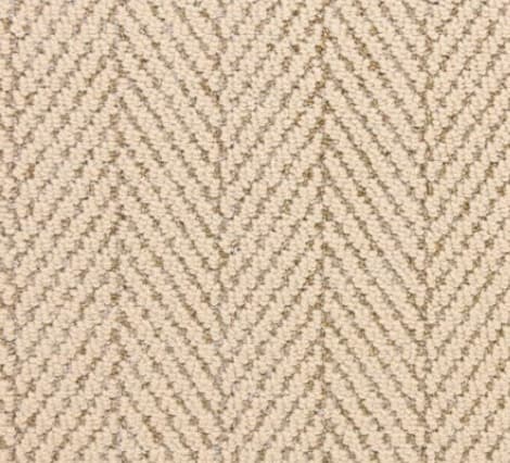 Luxurious beige herringbone carpet with soft texture, ideal for home and office flooring.