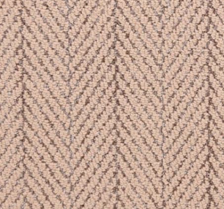 Close-up of textured beige herringbone carpet flooring at Creative Floors, Vail.