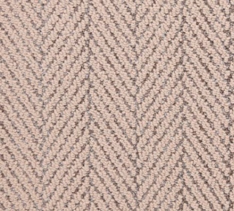 Soft beige herringbone carpet flooring for cozy home interiors.