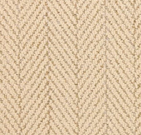 Soft beige herringbone carpet with textured pattern, ideal for luxurious residential or commercial flooring.
