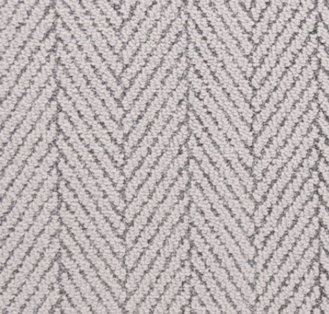 Textured beige herringbone carpet for luxurious flooring solutions.