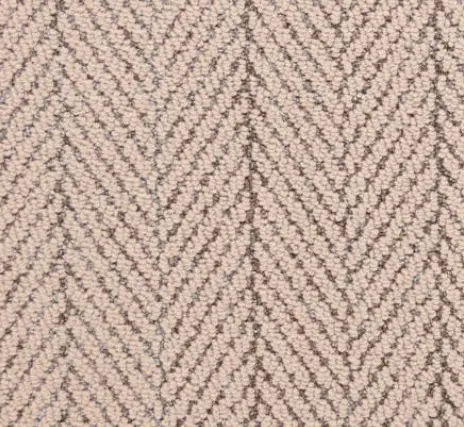 Warm beige herringbone carpet for residential and commercial flooring installations.