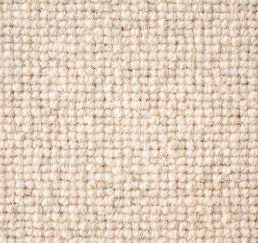 Cream textured wall-to-wall carpet showcasing plush, durable, and stylish flooring options.