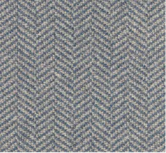 Wool herringbone patterned fabric flooring close-up.