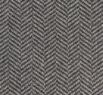 High-quality herringbone carpet in neutral gray tones, perfect for stylish commercial spaces.