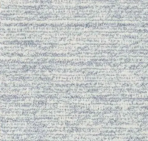 Light gray textured carpet flooring with subtle pattern, perfect for modern home interiors.