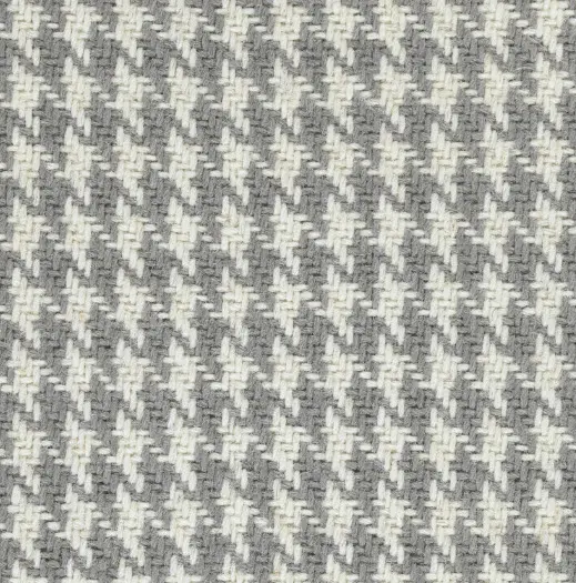 Soft houndstooth patterned carpet in neutral tones, ideal for modern home or office flooring.