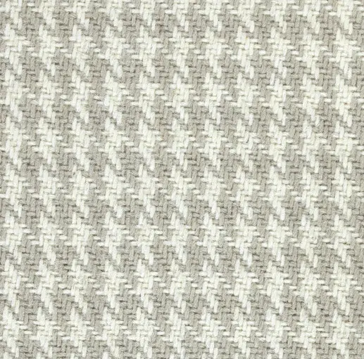 Cream and beige herringbone patterned carpet flooring for stylish interior design.
