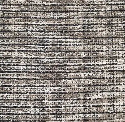 Luxurious textured patterned carpet with neutral tones for home or office flooring.