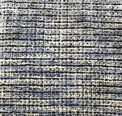 Colorful contemporary area rug with textured pattern, perfect for modern interiors.