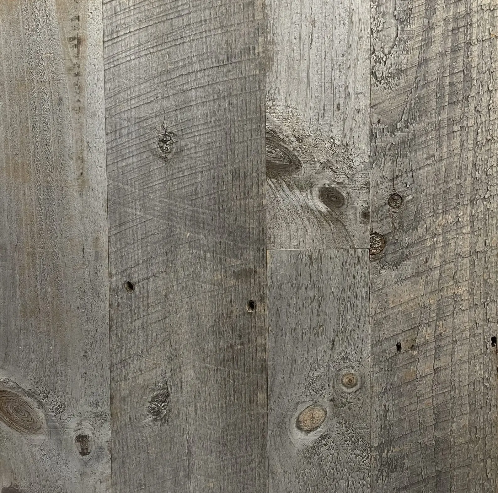 IMG_2500 Reclaimed barn wood flooring with rustic weathered texture and natural knots, ideal for flooring or interior design.