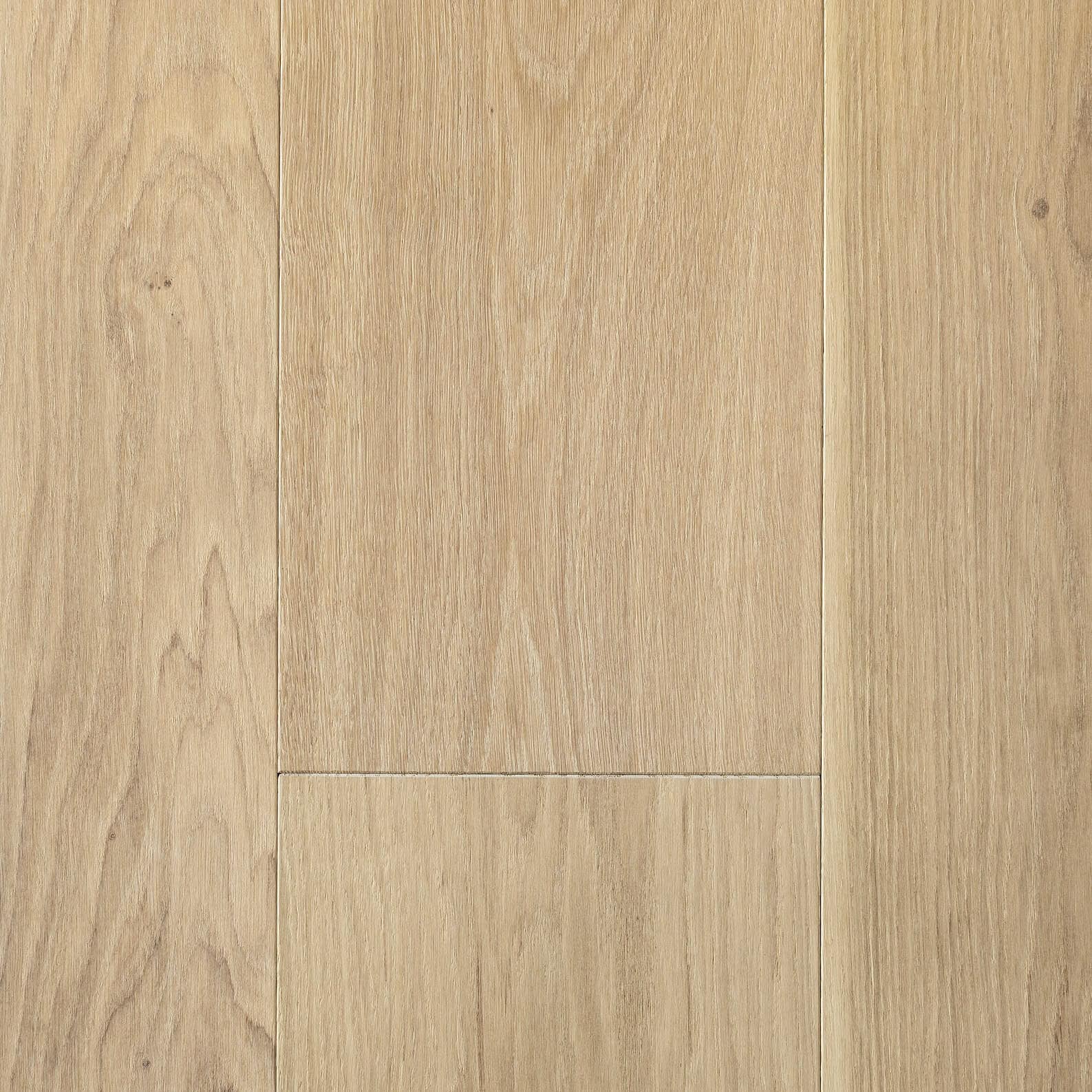 Natural oak hardwood flooring with a smooth finish for residential and commercial spaces.