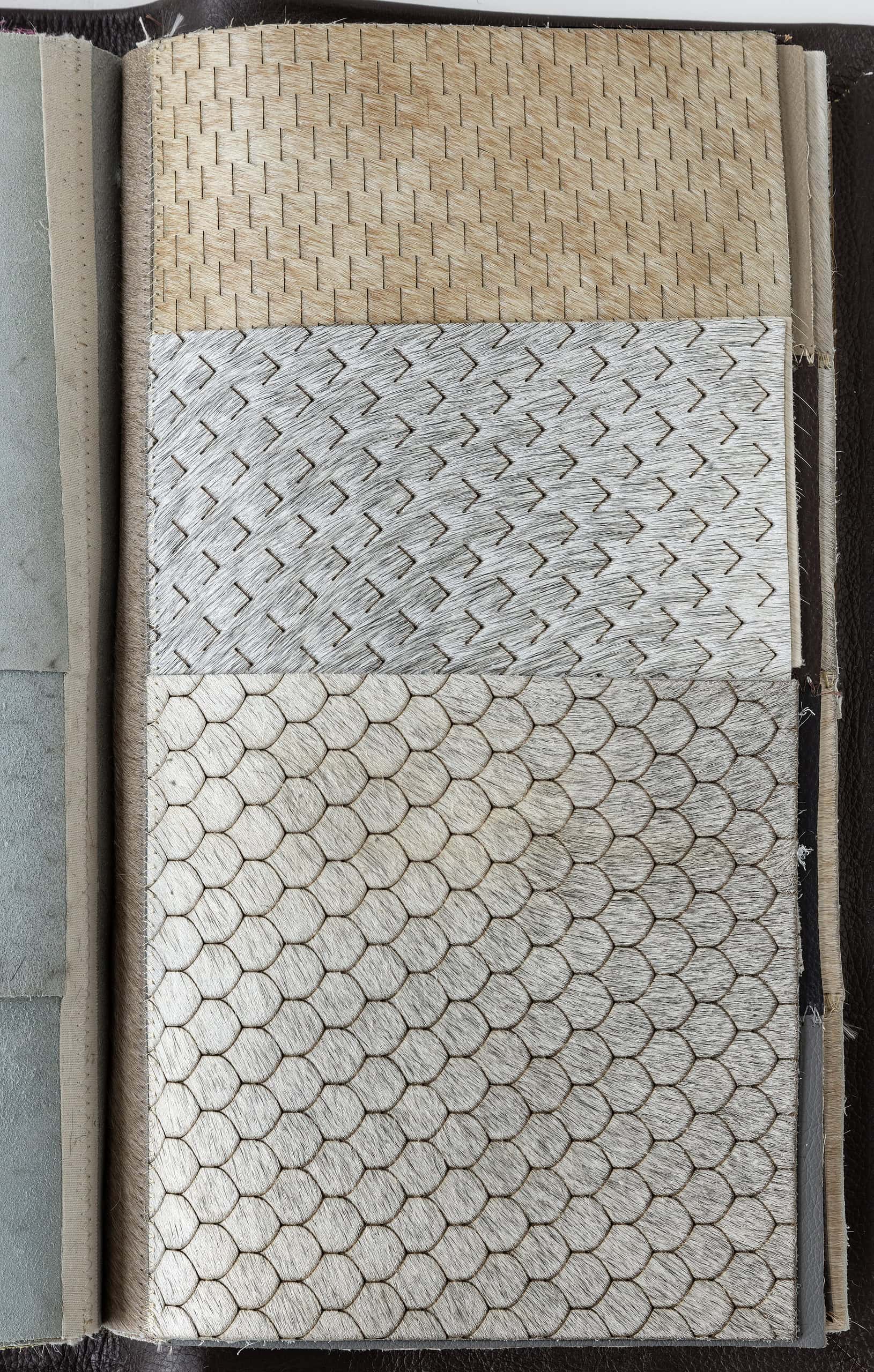 Natural wood textured flooring samples showcasing different patterns and finishes for flooring installation.