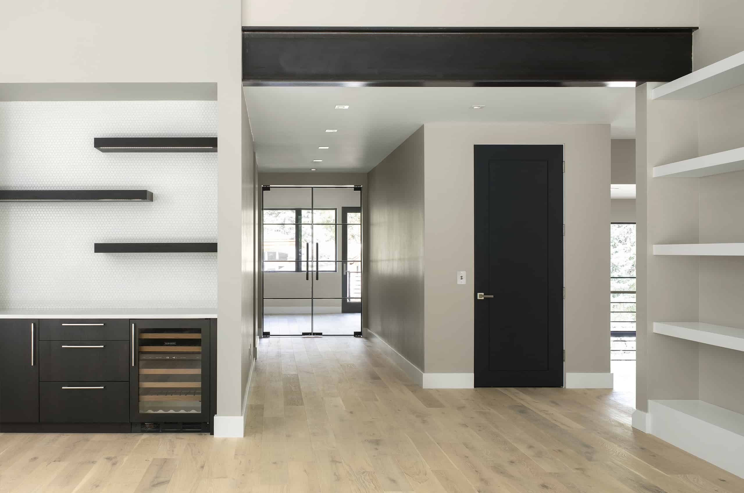 Warm light hardwood floors in modern interior design of residential living space.