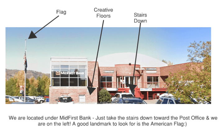 American Flag on building during daytime.