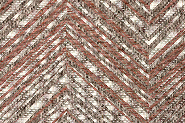 Colorful herringbone patterned area rug with earthy tones, ideal for enhancing modern or rustic interiors.