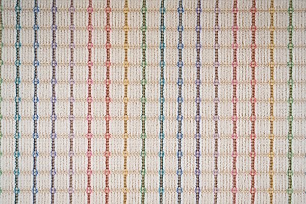 Colorful patterned carpet with geometric design, perfect for modern interior flooring.