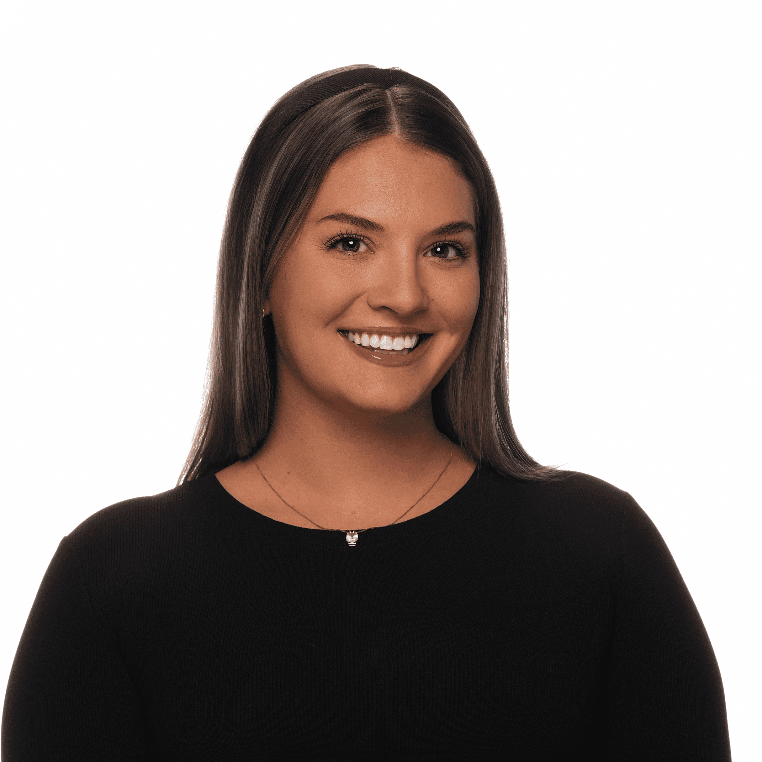 Beautiful young woman with long brown hair wearing a black top, smiling.