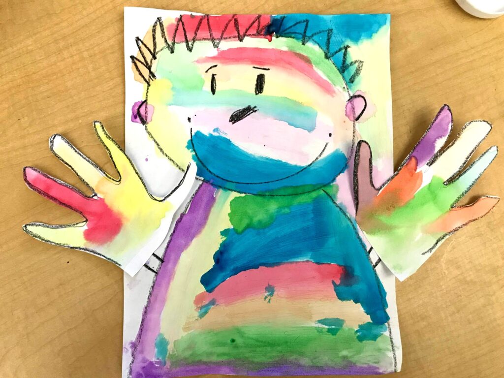 A student-completed self-portrait with water color