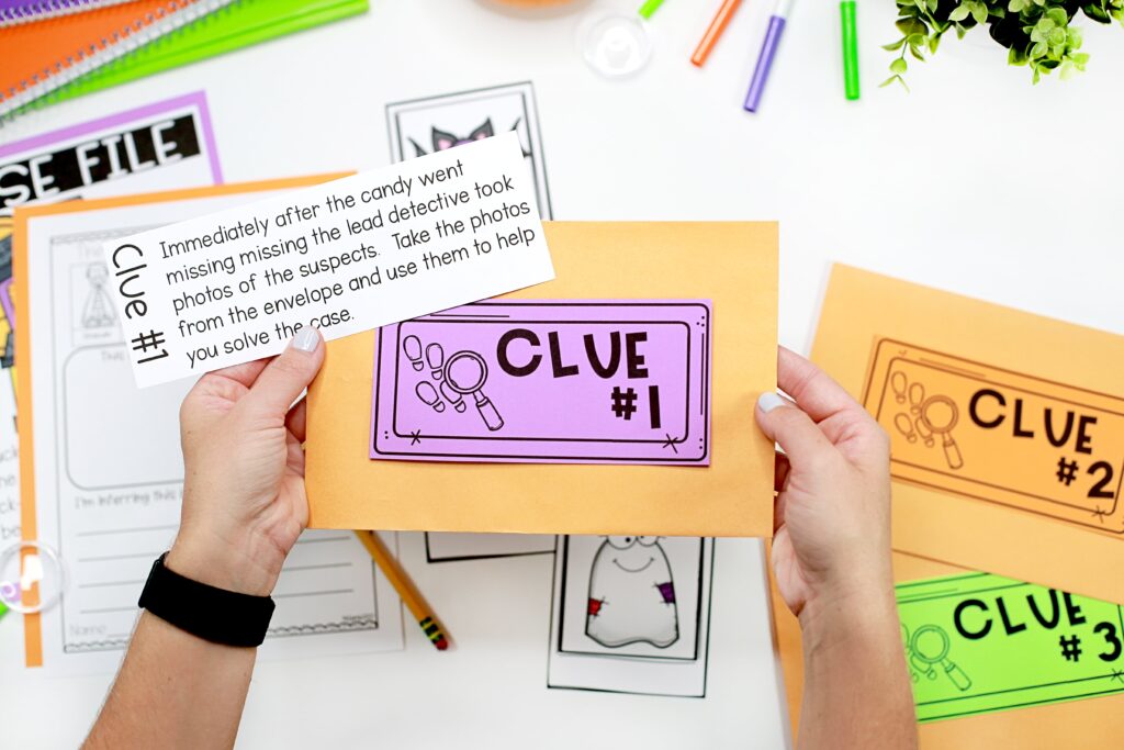 Holding clue #1 and the envelope it came in