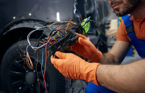 Auto electrical wiring repair for vehicle diagnostics and maintenance.