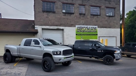 Custom lifted trucks with aftermarket wheels at Dirty D’s Performance.