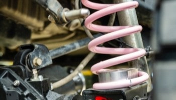 Custom suspension coilover for enhanced vehicle handling and ride quality.