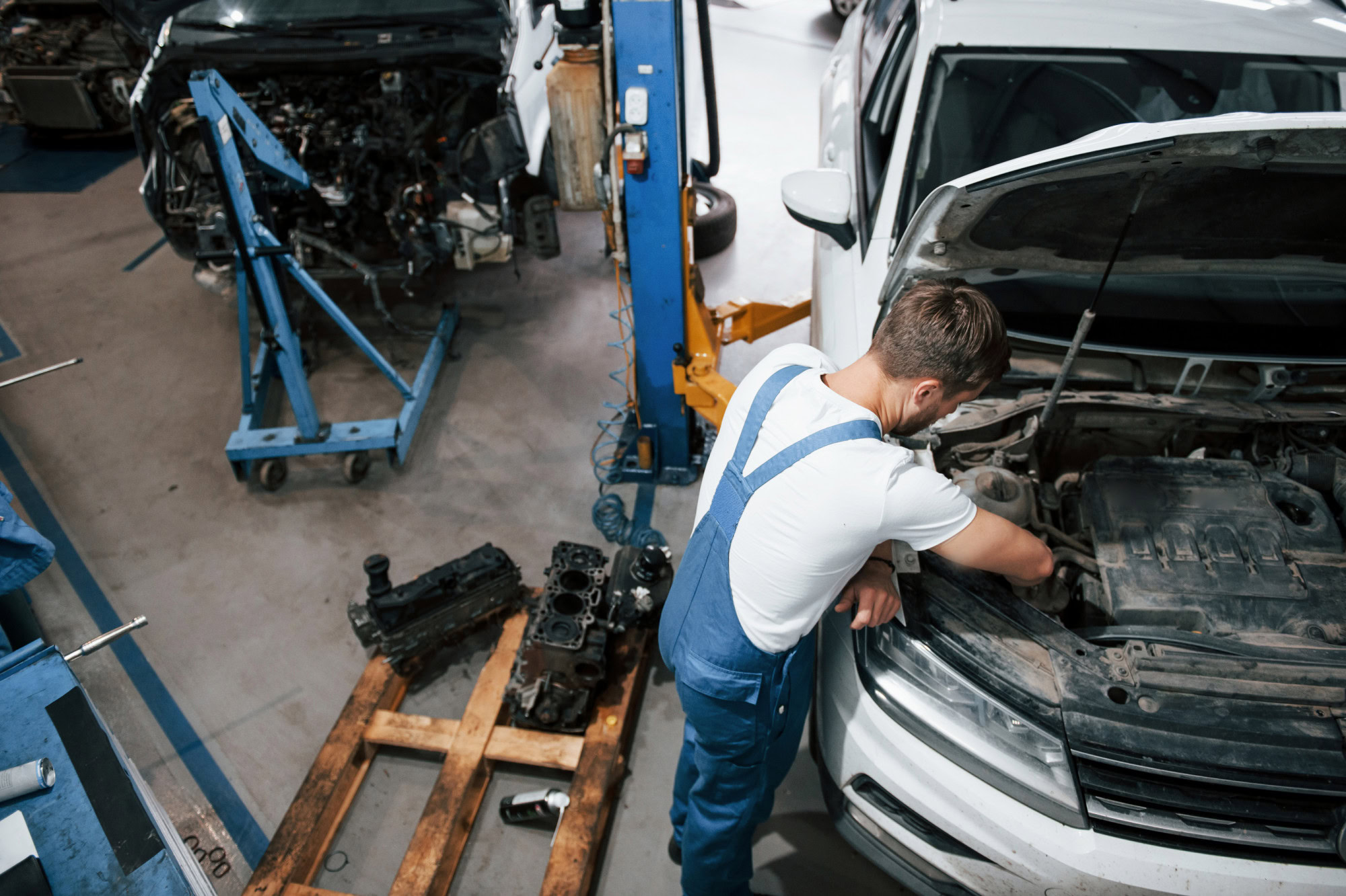 Mechanic carrying out engine inspections