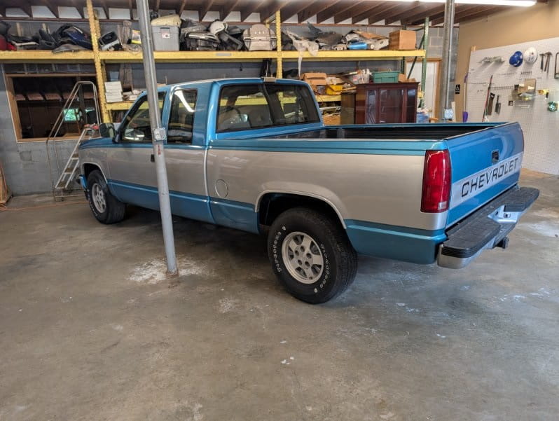 Chevrolet pickup truck in workshop at DrivenMotos Auto Care Clinic.