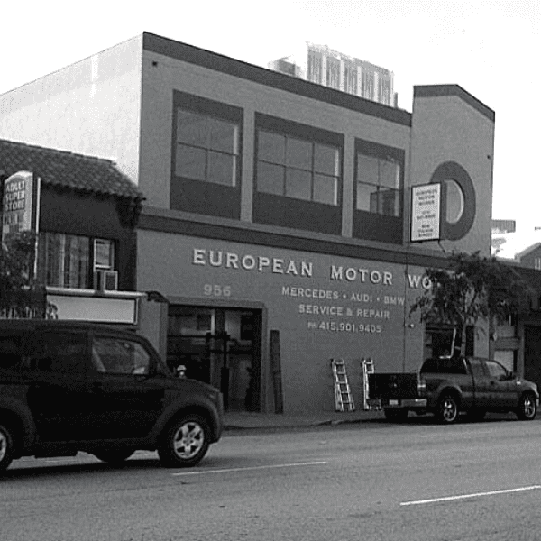 European Motor Works auto repair shop exterior, contact information visible.
