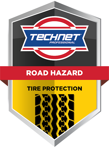 Road hazard tire protection sign with tire tread graphic and TechNet logo.