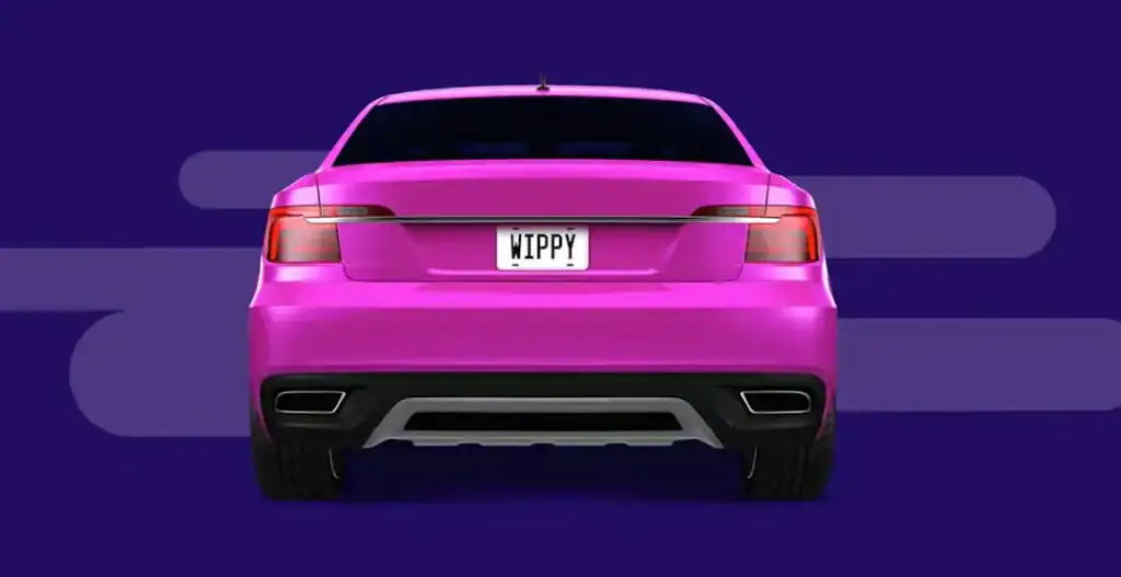 Pink car with Wippy license plate for car upgrades and repairs.