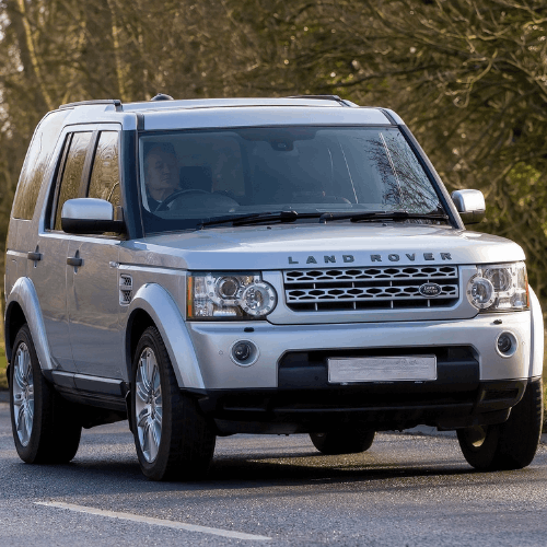 Silver Land Rover SUV parked outdoors, ready for vehicle service.