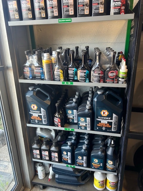 Auto repair products and engine oils on display at First Auto Garage.