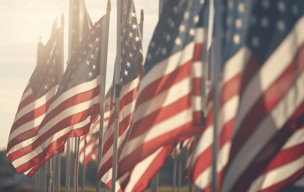 American flags at sunset, symbolizing quality auto repair and service.