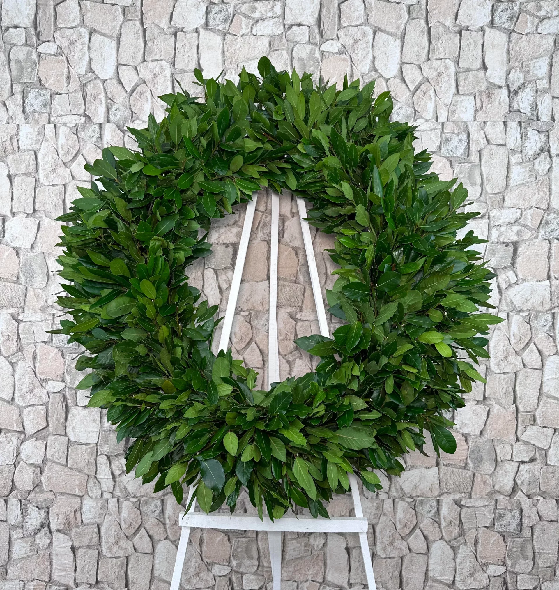 Corona funeraria de laurel